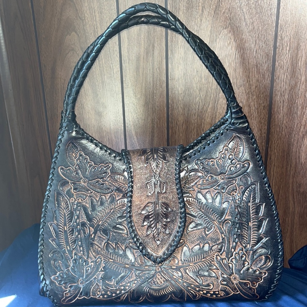 Alejandro yeo black and brown leather bag